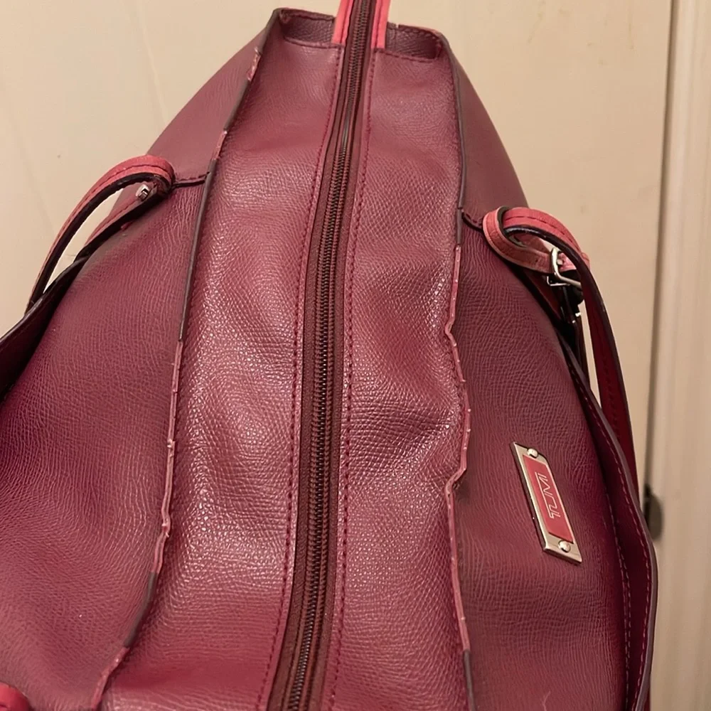 Tumi please check all picture of condition - Picture 9 of 17